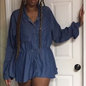 Medium to dark blue denim shirt.